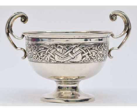 A silver Celtic two handled bowl, by Charles Weale, Birmingham 1929, with Dublin import marks for 1929, with embossed and cha