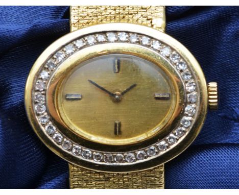 A L.U. Chopard, an 18ct gold manual wind ladies wristwatch, London import 1966, gold dial with baton markers, the bezel set w