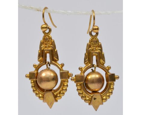 A Victorian pair of 9ct gold hollow drop ear rings, stamped 9c, articulated balls, 30mm, 2.6gm