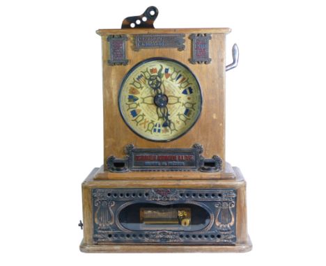 A Pierre Abel-Nau "Le Phenix" slot counter top slot machine / music box, c.1903, wooden case burned with serial number 1469, 