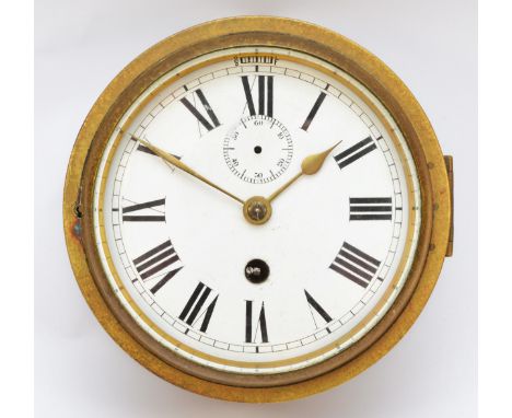 An early 20th century brass 5 1/2" dial bulkhead clock, white enamel dial with subsidiary seconds dial.