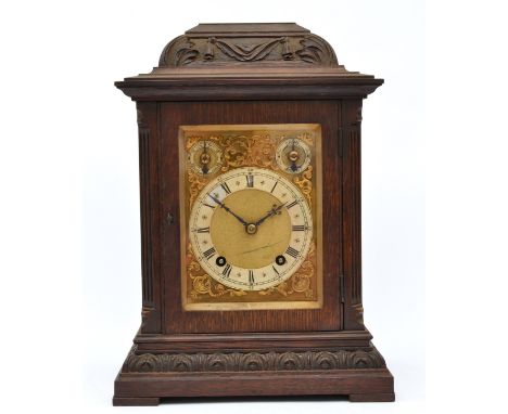 Winterhalder &amp; Hofmeier, a German oak case mantel clock, silvered chapter ring with slow/fast and chime/silent dials, sig