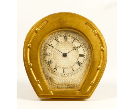 An English ormolu horseshoe clock in the manner of Thomas Cole, 3/4 plate movement with dust covers to rear for wind, adjust 
