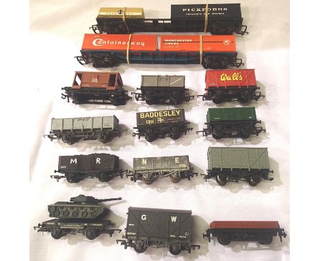 Fourteen assorted OO scale wagons, various makes and types, mostly good condition, unboxed. P&amp;P Group 1 (£14+VAT for the 