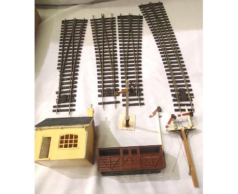 Four O gauge Peco points; short RH x2, short LH x1, long curve LH x1, all in used but working condition, and a resin Hot Catt
