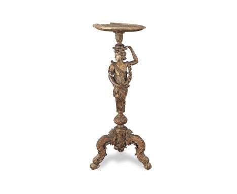 A Dutch late 17th/early 18th century carved giltwood figural tripod torchere1700-1710The dished circular top with a moulded s