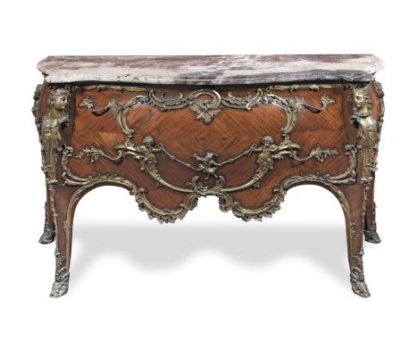 A French late 19th century ormolu mounted bois satine and rosewood bombe serpentine commode made by Francois Linke (1855-1946