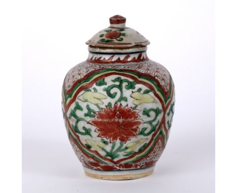 Polychrome jar and cover  Chinese, Ming period painted with iron-red lotus, each in a panel, 15cm high Ex Trevor Ford collect