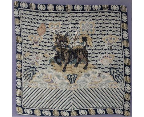 Embroidered military rank badge Chinese, 19th Century depicting a 1st rank qilin on black ground, stitched in coloured thread