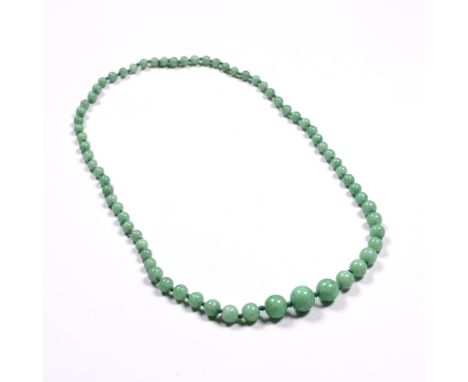 Jade necklace  Chinese light apple green with graduated round beads 'Chinese knots', 41cm across