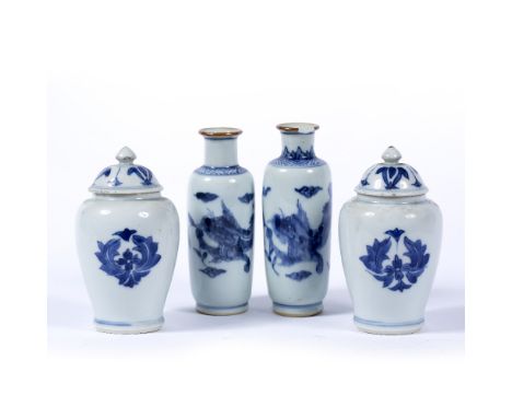 Pair of lidded vases Chinese, Kangxi period (1661-1722) decorated to the body with stylized lotus flowers, 13cm high, togethe