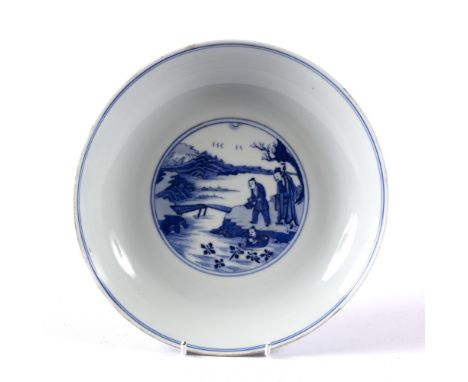 Blue and white dish Chinese, Kangxi period (1662-1722) decorated to the centre with a circular roundel depicting figures by a