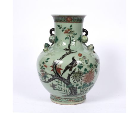 Canton celadon vase Chinese, late 19th Century with gourd handles and painted with grass hopper and blossom, 37cm high