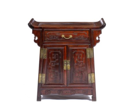 Hongmu altar cabinet Chinese, 19th/20th Century carved with a scroll top, with a single long drawer to the top and a fitted i