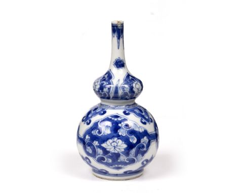 Small blue and white double gourd bottle vase Chinese, Kangxi (1662-1722) with panels of lotus and other flowers,15cm Provena