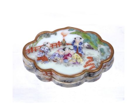 Enamel porcelain ink pot and cover Chinese, Republic period of oval shaped form, painted with boys playing in a garden and wi