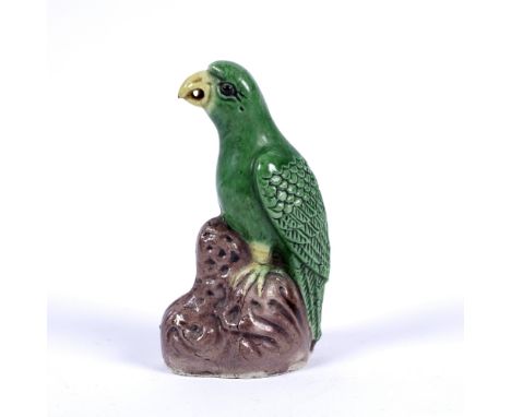 Porcelain miniature model of a green glazed parrot Chinese, 19th Century Kangxi style, with yellow glazed beak and claws perc