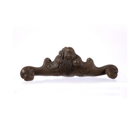 Yixing brush rest Chinese, 20th Century in the form of a sage, impressed seal mark, 19cm across