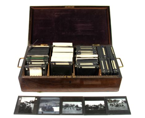 A rosewood cased collection of glass lantern slides, approx. 150.