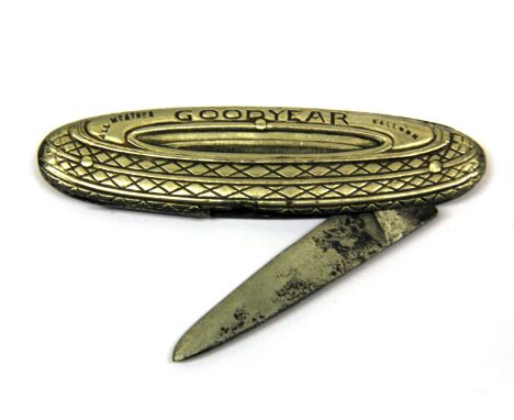 A vintage Goodyear advertising pocket knife.