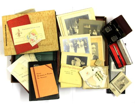 A vintage case containing a stereoviewer, mixed ephemera etc.