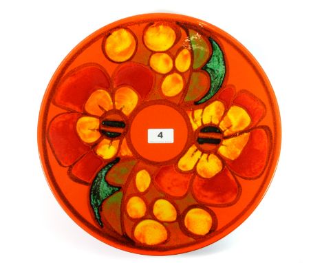 A 1970's Poole pottery charger, D. 35 cm.
