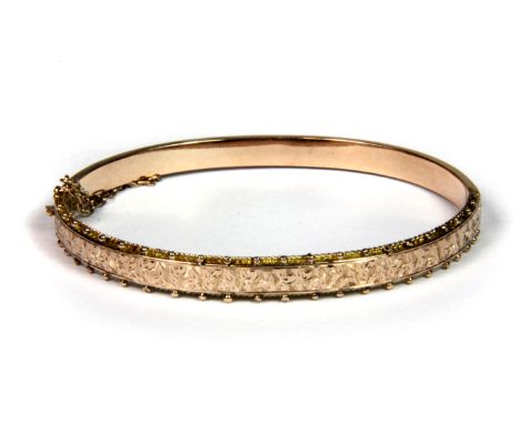 A Victorian 9ct rose gold bangle, (approx. 7.1gr).
