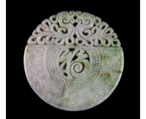 A beautifully carved Chinese pale lavender, white and green jade amumlet, Dia. 5cm.