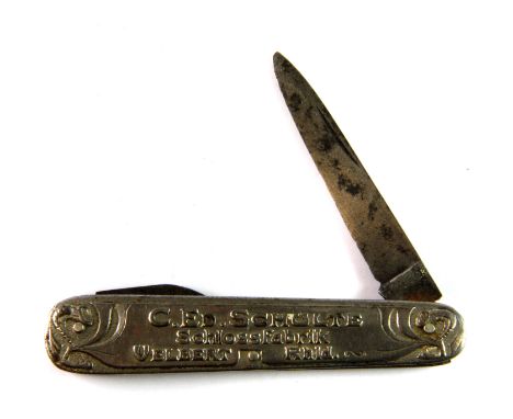 A vintage C.Ed. Schulte Schlossgabrick advertising pocket knife.