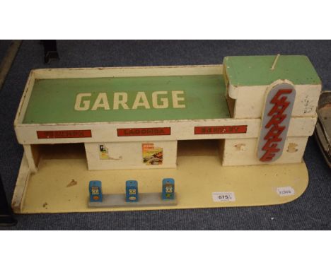 A pair of French Art Deco style alabaster mounted uplighters, 50 cm wide, a silver plated tray, and a toy garage (4)

 