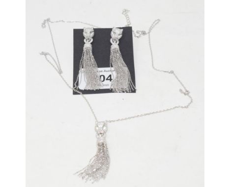 A silver Cartier style panther necklace and matching earrings (2)

Modern 