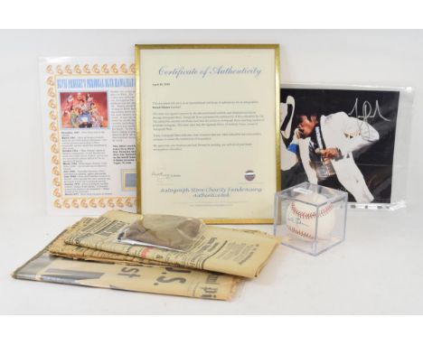 A baseball ball, signed by Barack Obama, with certificate, a signed photograph of Michael Jackson, with certificate, newspape