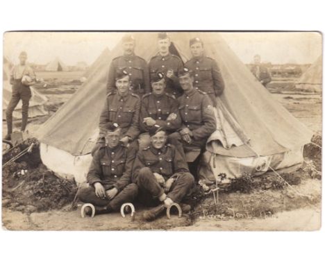 Highland Light Infantry WWI-RP postcard group of eight 'some tent' - in a muddy camp