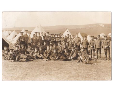 Royal Army Medicval Corps WWI-RP postcard, large group at camp pub Swain, Norwich-message from Frank Hayhoe reads ' arrive at