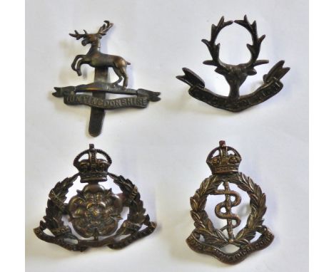 British WWI Bronzed Officers Cap Badge Collection (4) Including: Royal Army Medical Corps (Lugs), Derbyshire Yeomanry (slides