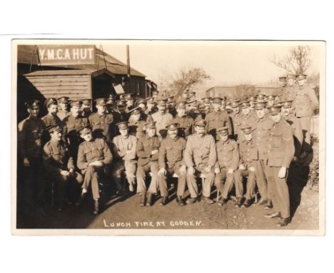 Royal Artillery (mostly) WWI 'Lunch Time at Gooden' large group outside YMCA Hut, light corner crease.