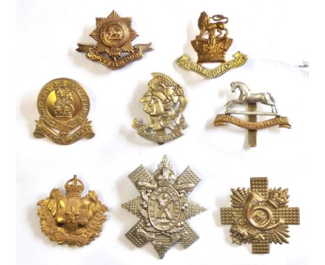British WWI Cap Badge Collection (8) Including: The 14th King's Hussars, The Highland Cyclist Battalion T.F, The Lincolnshire