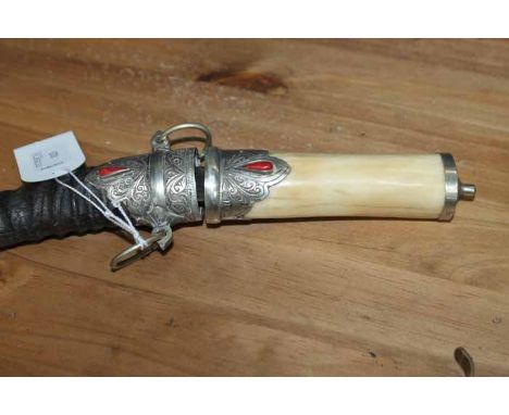 BONE AND ANTLER DAGGER
the handle formed by a section of bone, the cover formed from an antler, with overlaid decorative hard