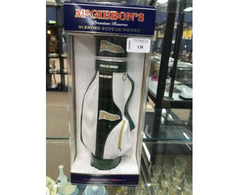 McGIBBONS PREMIUM RESERVE BLENDED WHISKY
a collector's series in a golf bag ceramic decanter, in original box, 34cm high