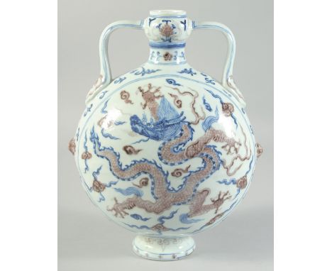 A CHINESE BLUE, WHITE AND UNDERGLAZE RED DRAGON MOON FLASK, four-character mark to base, 28.5cm high.