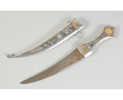 A FINE LARGE IRAQI NIELLO AND GOLD INLAID SILVER DAGGER, 35.5cm long.