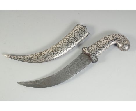 AN INDIAN SILVER INLAID DAGGER AND SCABBARD, with damascened steel blade, 35cm long overall.