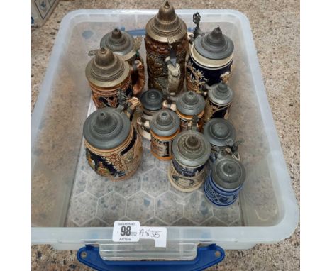 CARTON WITH VARIOUS SIZES OF CERAMIC STEINS