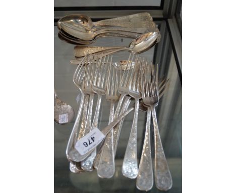 A large group of matching sterling silver flatware comprising twelve dinner forks, eleven spoons, five teaspoons, a further S