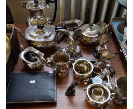 A mixed lot of assorted silver-plate and metalware to include sculpture of an eagle, tea service etc.