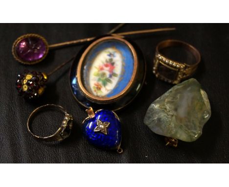 A Victorian seed pearl and hairwork mourning ringTogether with, two gem set stick pins, an enamel and seed pearl heart clasp 