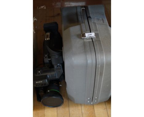 A Sony Hyper HAD video camera, with Cannon zoom lens, VCL-713BX, fitted in hard plastic carrying case