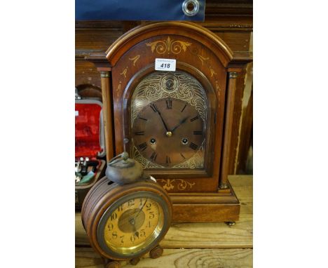 An Edwardian mahogany inlaid silent chime bracket clock