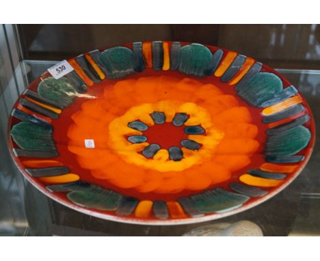A Poole Pottery Volcano pattern 16 inch charger.