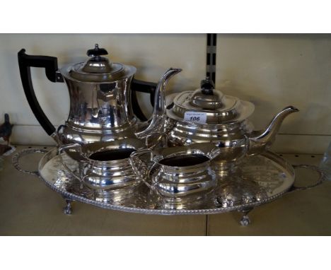 A silver-plated four piece tea service with tray.